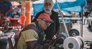 Old man is forced to work with heavy machinery